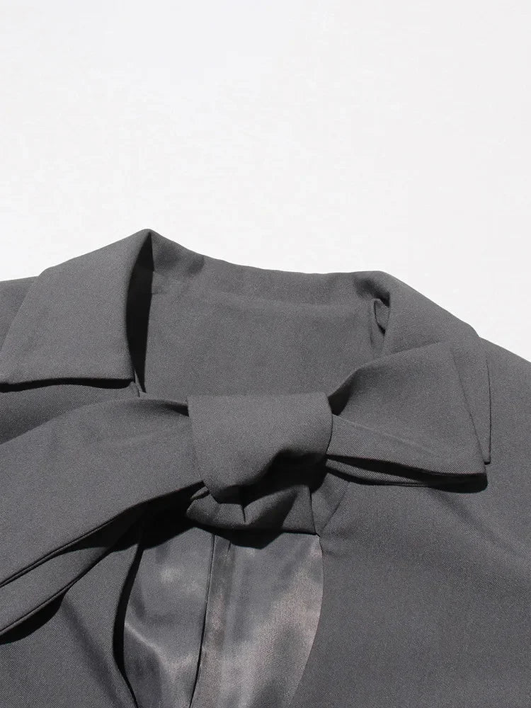 Blazer élégant à patchwork et nœuds, chic et féminin pour toutes occasions