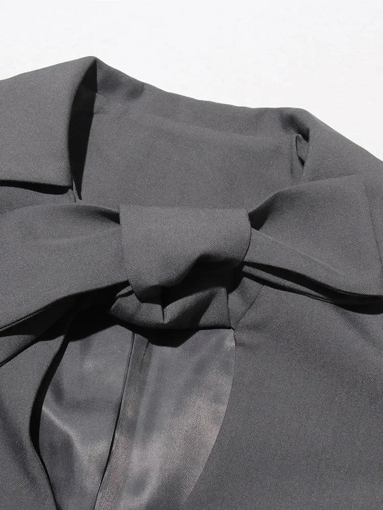 Blazer élégant à patchwork et nœuds, chic et féminin pour toutes occasions