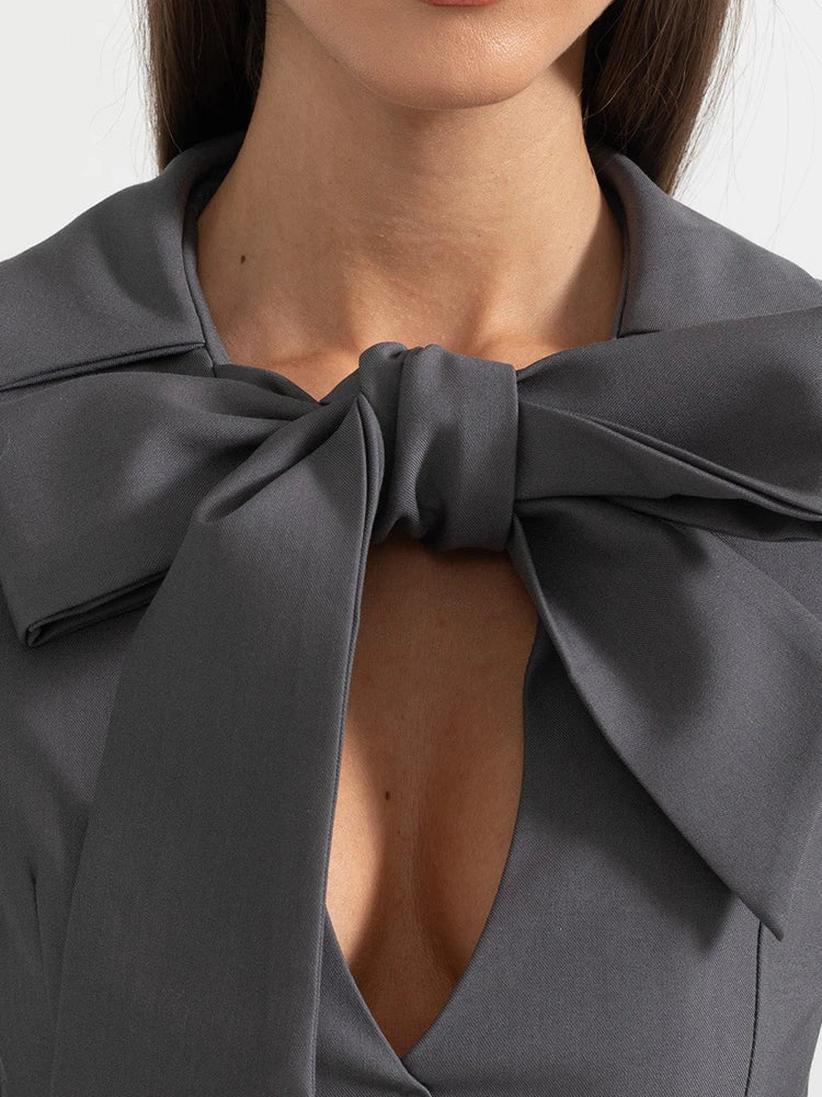 Blazer élégant à patchwork et nœuds, chic et féminin pour toutes occasions