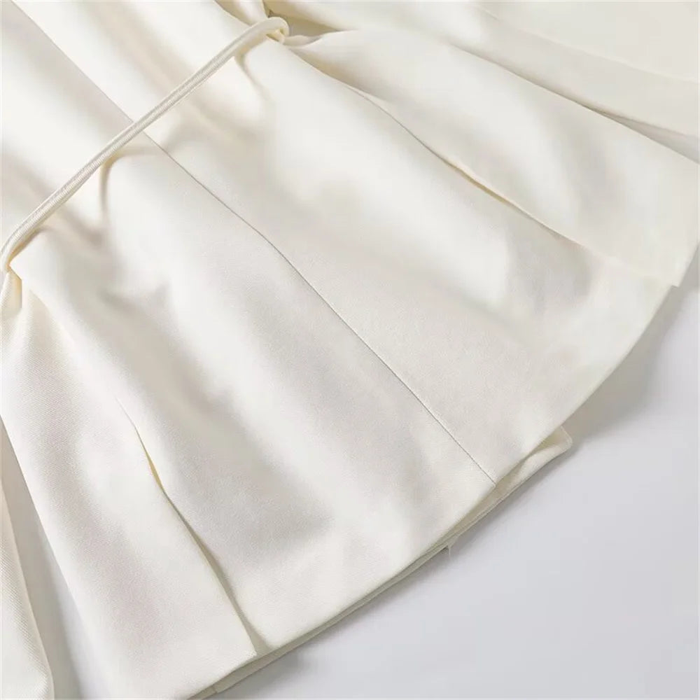 Blazer femme à manches longues avec ceinture polyvalente + pantalon plissé taille haute tendance – Style décontracté et moderne.