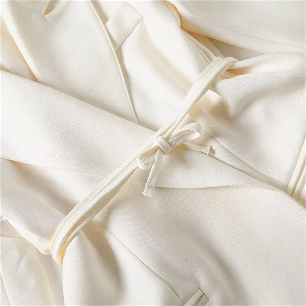 Blazer femme à manches longues avec ceinture polyvalente + pantalon plissé taille haute tendance – Style décontracté et moderne.